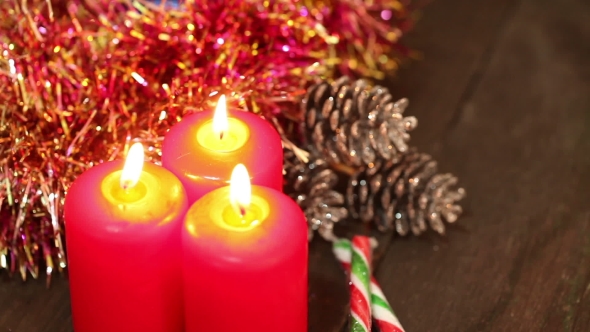 Three Burning Christmas Candles