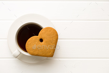 Photodune Gingerbread heart shape and coffee mug. 18737415
