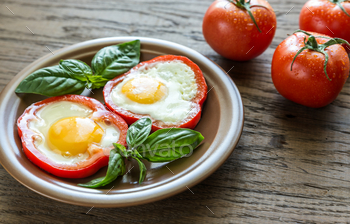 Photodune Fried eggs in bell pepper slices 18753204