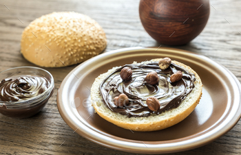 Photodune Seasame bun with chocolate cream and nuts 18753206
