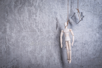 Photodune Wooden figure of human and house in a hangmans loop 18769816