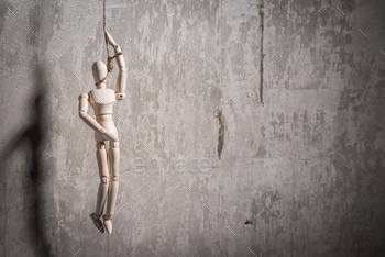 Photodune Wooden figure of human in a hangmans loop 18780140