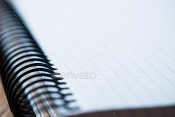 Photodune Notebook on a wooden table 18783861