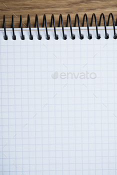 Photodune Notebook on a wooden table 18783863