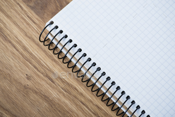 Photodune Notebook on a wooden table 18783870
