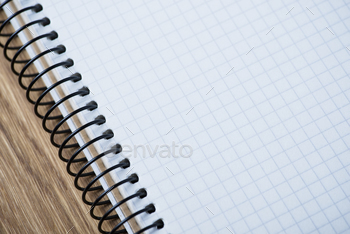 Photodune Notebook on a wooden table 18783871
