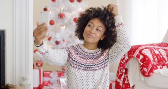 Young Woman Posing for a Christmas Selfie