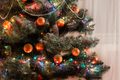 Photo of Christmas tree balls and garland hanging | Free christmas images