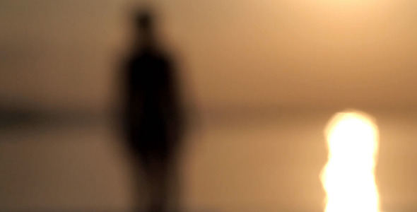 Silhouette Of Girl Walking On The Water Silhouette Of Girl Walking On The Water
