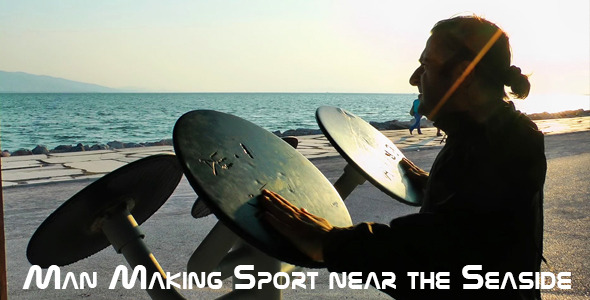 Man Making Sport Near The Seaside Man Making Sport Near The Seaside