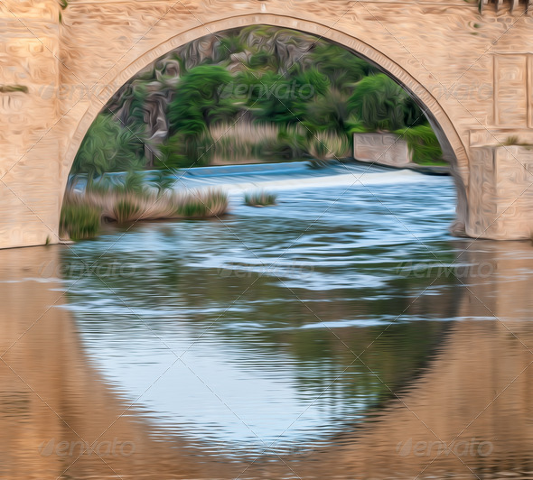Bridge reflects in river of Toledo, Spain, Europe.
