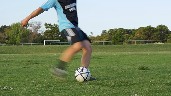 Soccer Player Kicking A Ball Slow Motion Soccer Player Kicking A Ball Slow Motion
