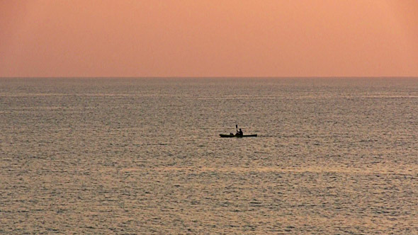Kayak Floating In The Sea At Dawn Kayak Floating In The Sea At Dawn
