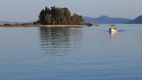 Tourist Boat Sailing from Pontikonisi Island Tourist Boat Sailing from Pontikonisi Island