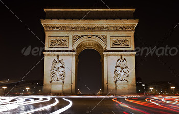 Illuminated Arc de Triomphe at night