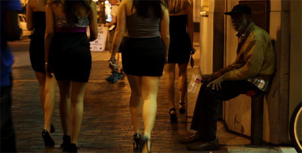 Homeless Man And Club Girls On City Street Homeless Man And Club Girls On City Street