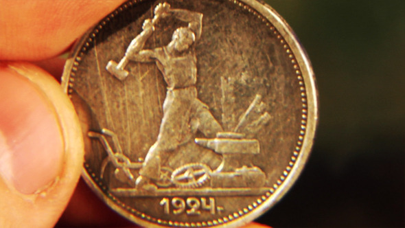 Examining An Old Coin 2 Examining An Old Coin 2