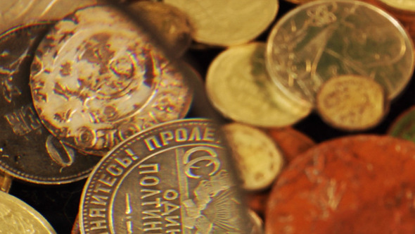 Examining An Old Coin 3 Examining An Old Coin 3