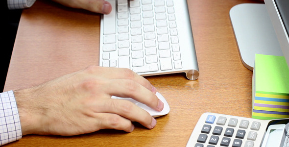 Businessman Working On A Keyboard In Perspective Businessman Working On A Keyboard In Perspective