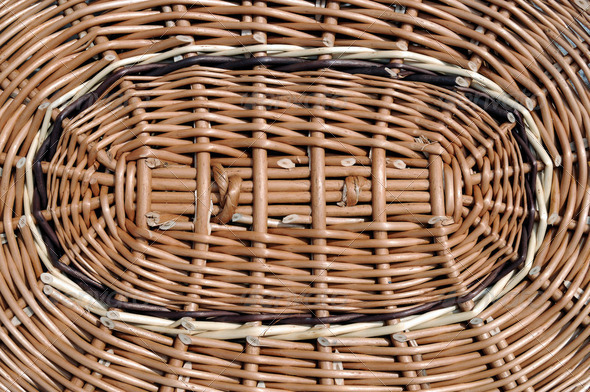 Wicker lid on the basket of brown willow