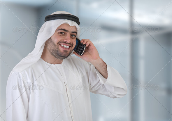 arabian business man in office having a phone call