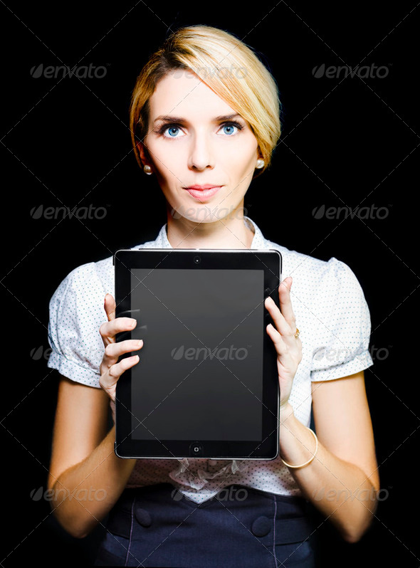 Business woman holding touchpad tablet - Stock Photo - Images