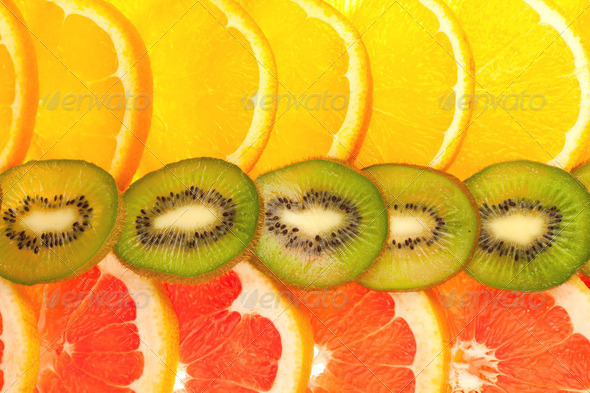 Fruity background set of whole orange, grapefruit and kiwi disks