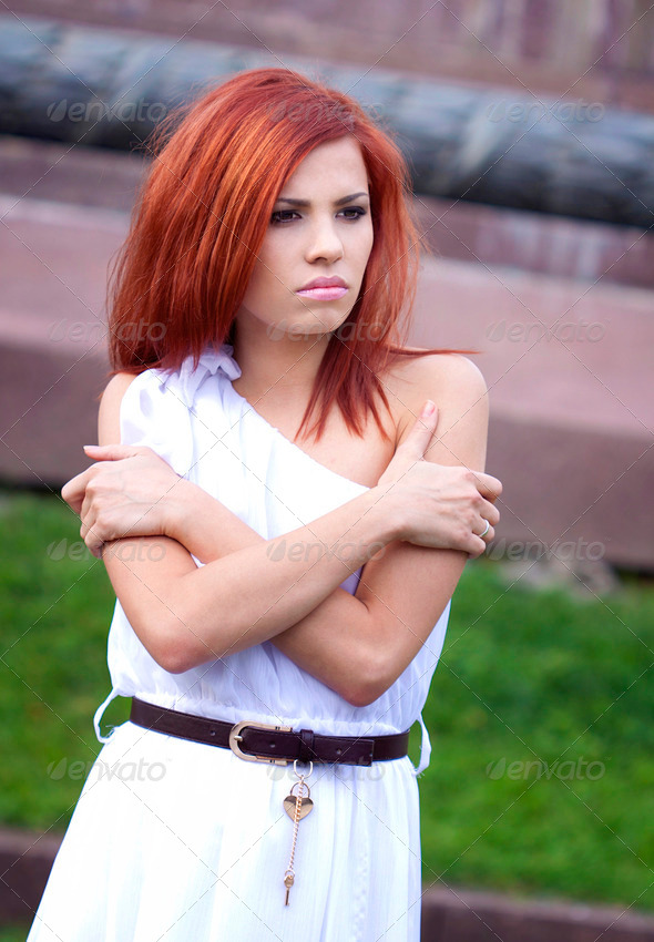 Sad red hair girl