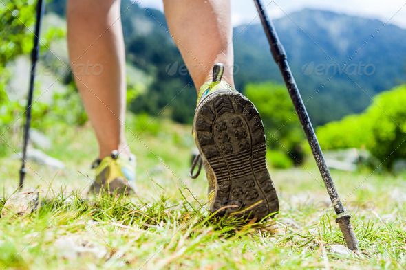 Nordic walking legs in mountains