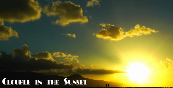Couple Walking in the Sunset Couple Walking in the Sunset