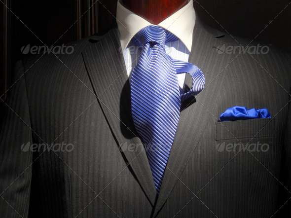 Striped jacket with blue striped tie and handkerchief