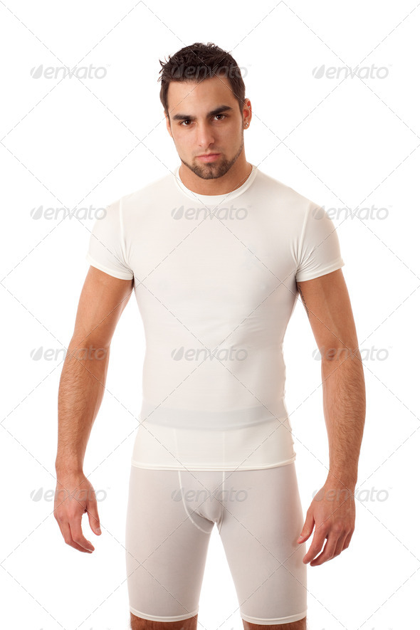 Man in tight wihite shirt and shorts. - Stock Photo - Images