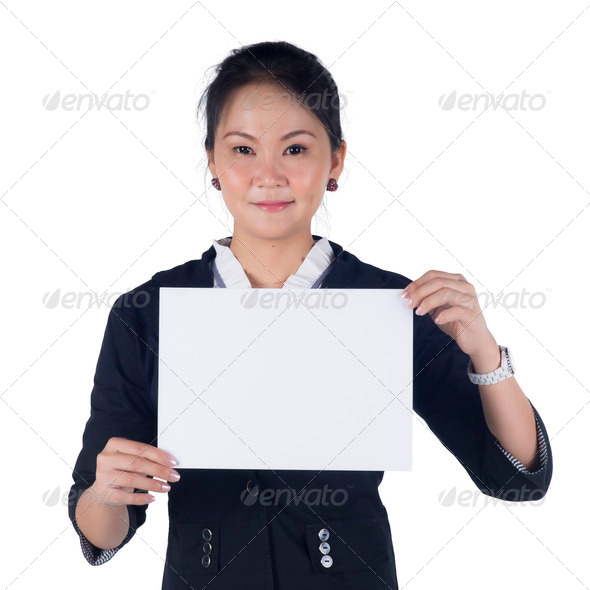 Business woman in black suit holding a blank sign board
