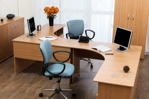 monitors on a desk