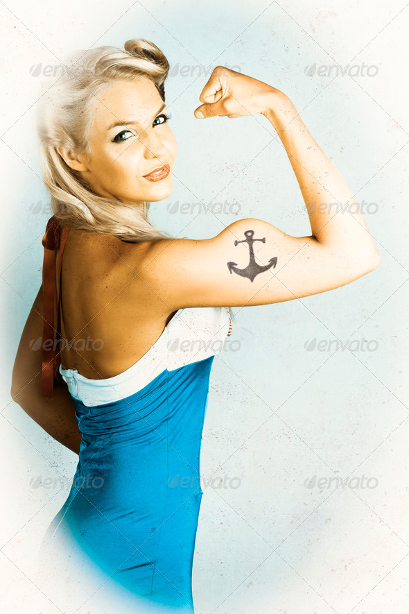 Fit Pin-Up Girl With Big Muscles And Anchor Tattoo