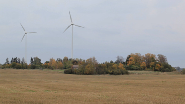 Two Wind Turbines In The Field Two Wind Turbines In The Field