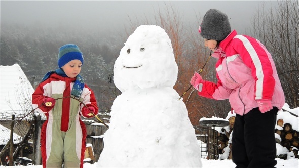 Kids And Snowman Kids And Snowman