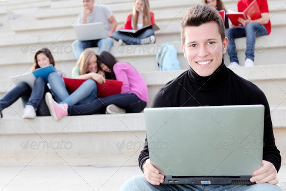 Boy university student with laptop or notebook