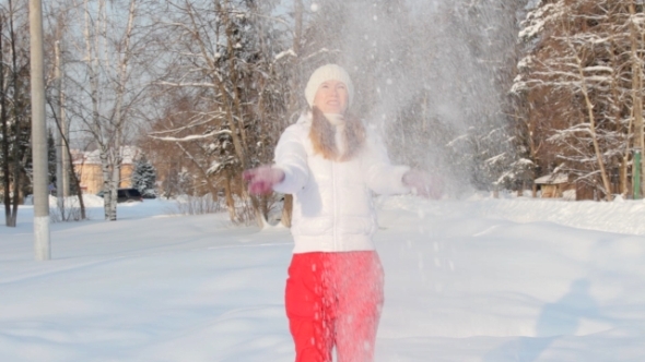 Girl Playing with Snow Girl Playing with Snow