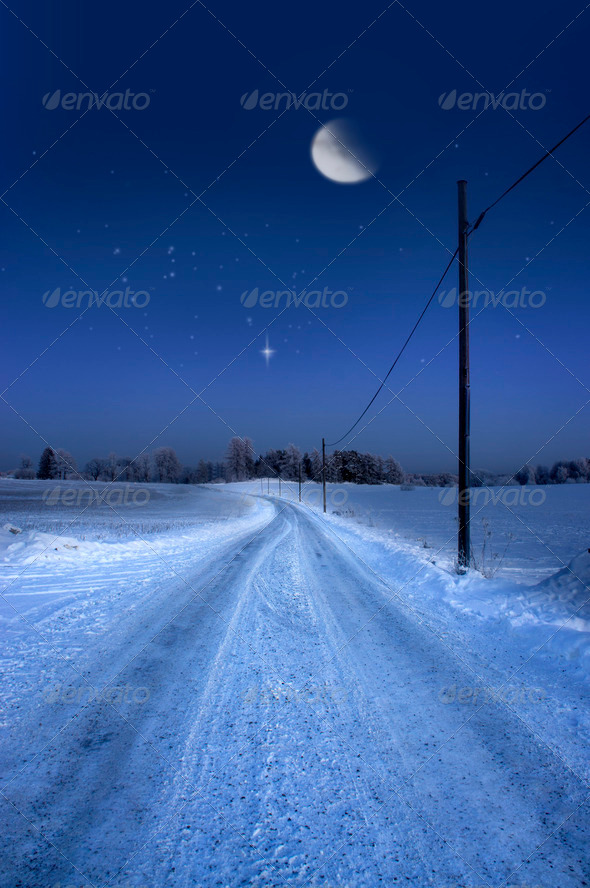 road in winter evening with moon