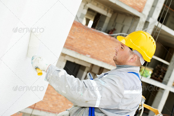 builder facade painter at work