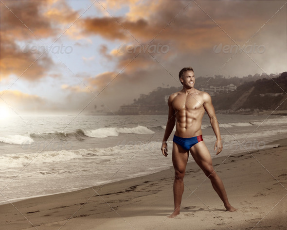 Bodybuilder on beach