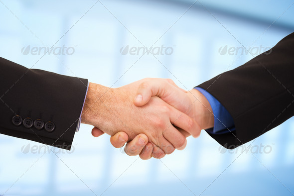 Two businessmen shaking hands