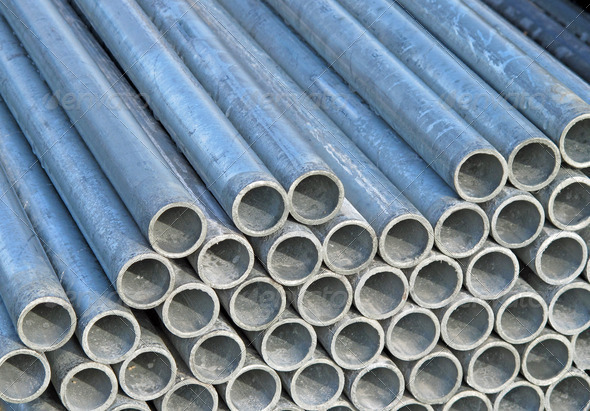 pile of iron pipes for the transport of electrical cables and op
