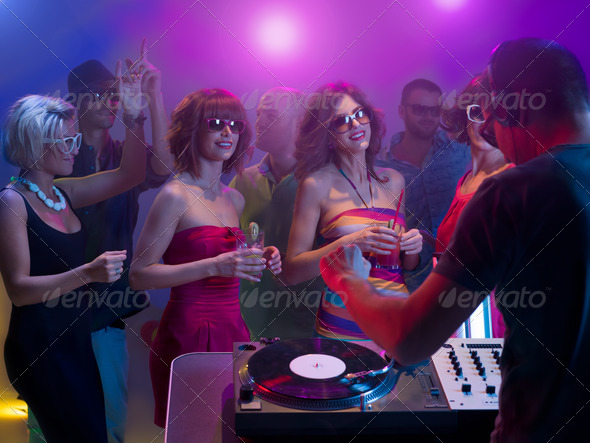 young caucasian people dancing at party - Stock Photo - Images