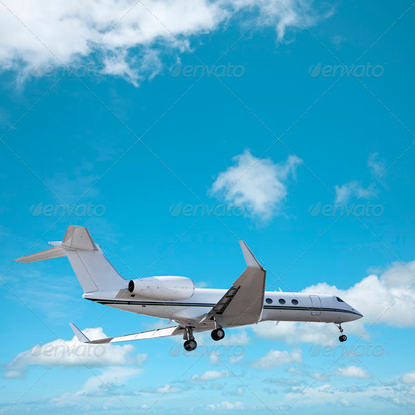 Private jet in a sky