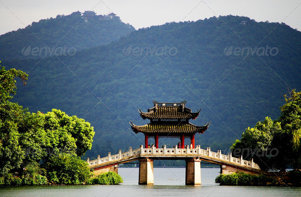 a pavilion bridge ( jade belt) in west lake, hangzhou, china