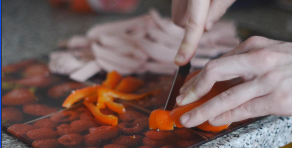 A Cook Cuts Pepper A Cook Cuts Pepper