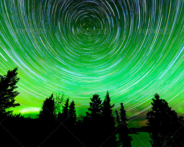 Star trails around Polaris and Northern lights