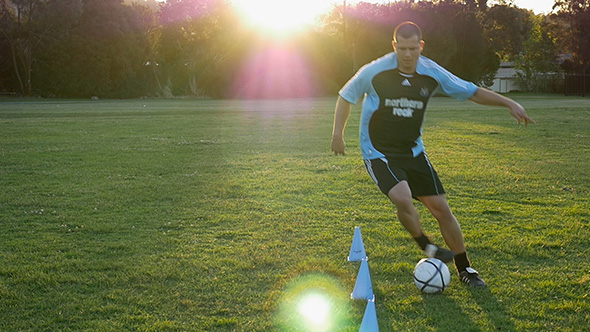 Soccer Football Player Dribble Through Cones Soccer Football Player Dribble Through Cones